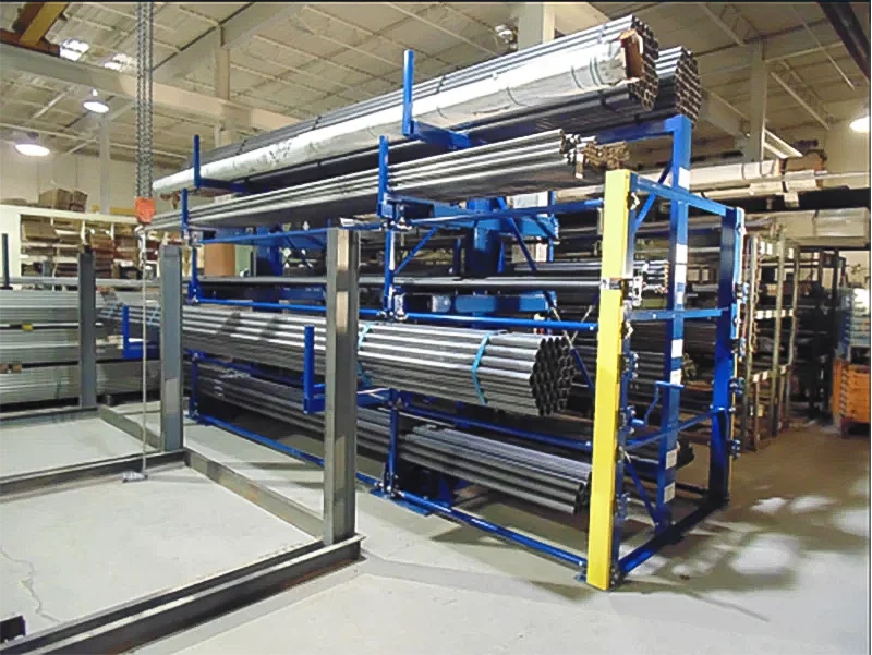 A blue telescopic cantilever rack saving space in a workshop