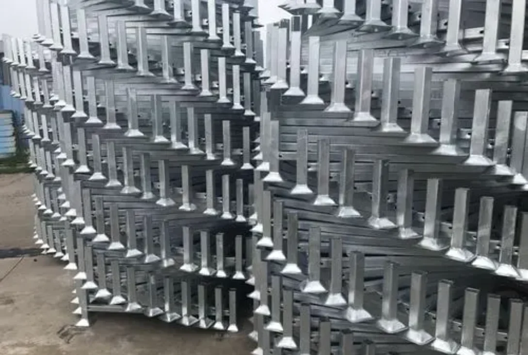 Galvanized portable stacking racks nested outdoors in a storage yard