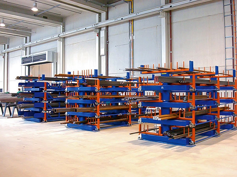 Heavy-duty telescopic cantilever racking storing long steel sections in a high-tonnage metal distribution center