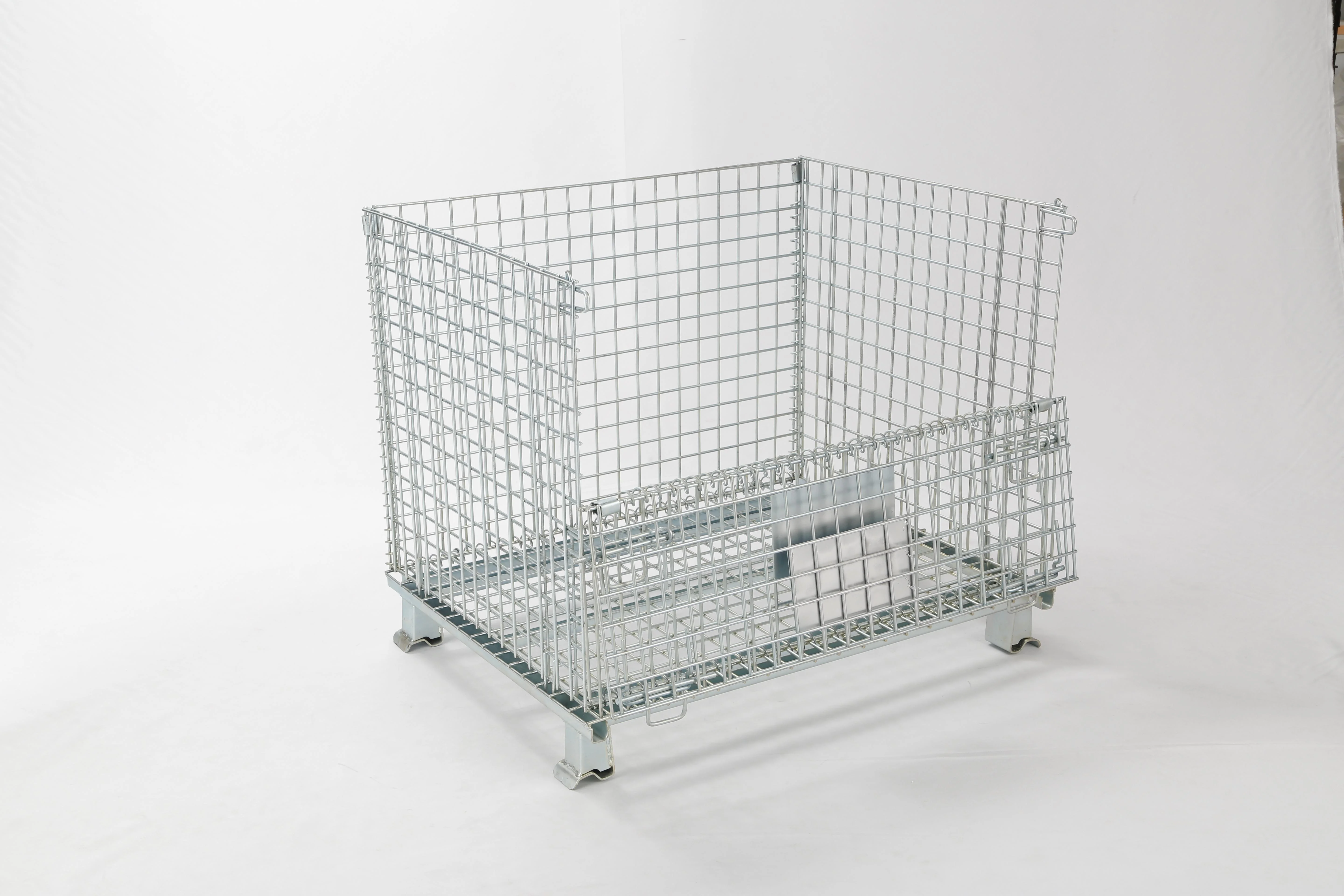 Fully assembled electro-galvanized wire mesh storage cage with half-drop front gate and stackable steel feet.