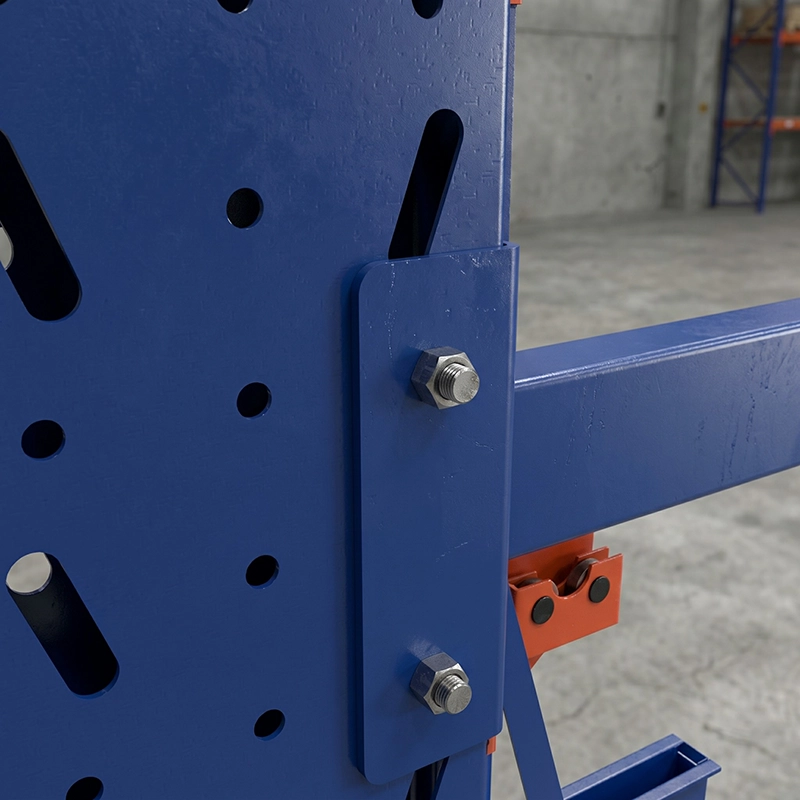 Detail of high strength bolt connection between blue steel column and horizontal structural frame with adjustable punched holes