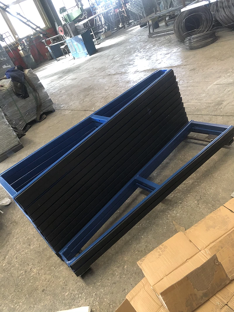 Close-up of steel-embedded rubber pads on a powder-coated A-frame panel storage rack