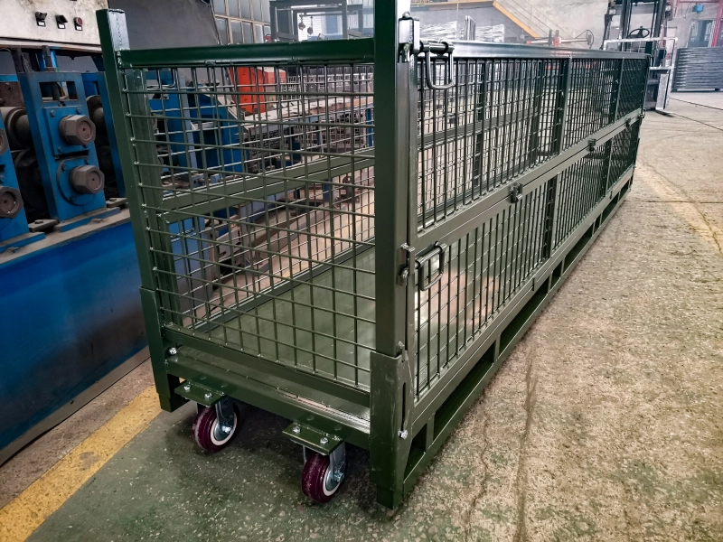 Extra-long custom green steel stillage with casters in production shop