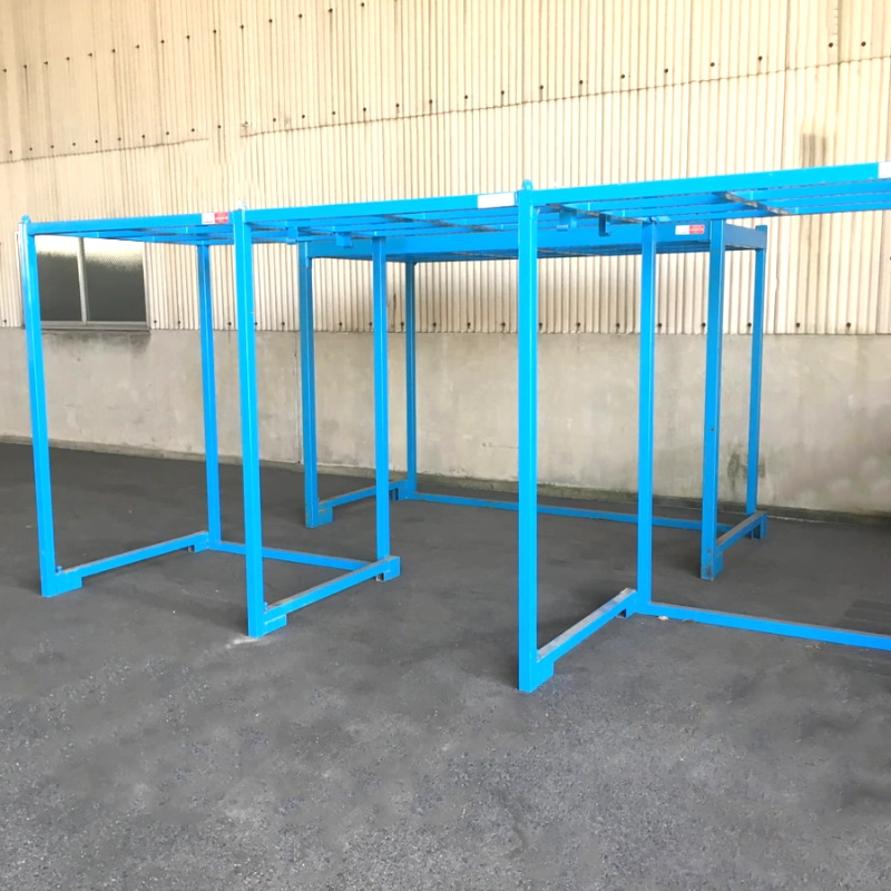 Powder-coated steel stack rack with tubular posts, fork-entry base, and nesting design