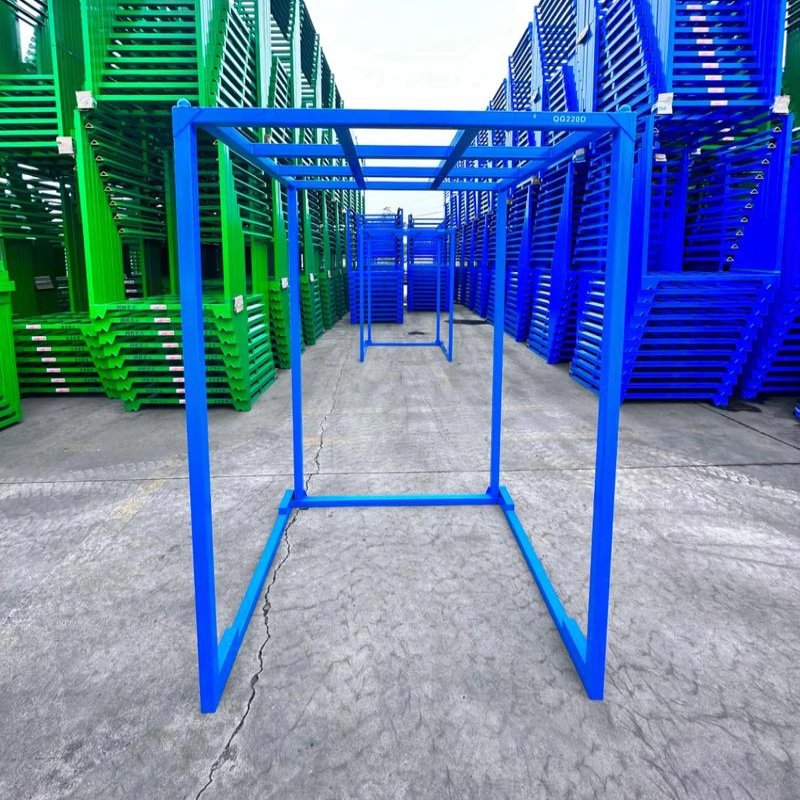 Blue heavy-duty welded tubular steel stack rack frames nested outdoors for palletized goods storage
