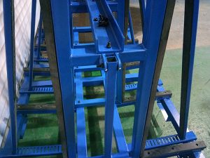 How does a precision glass racking system optimize the workflow for IGU manufacturers using square steel tube frames?